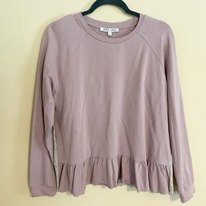 Long sleeved peplum top